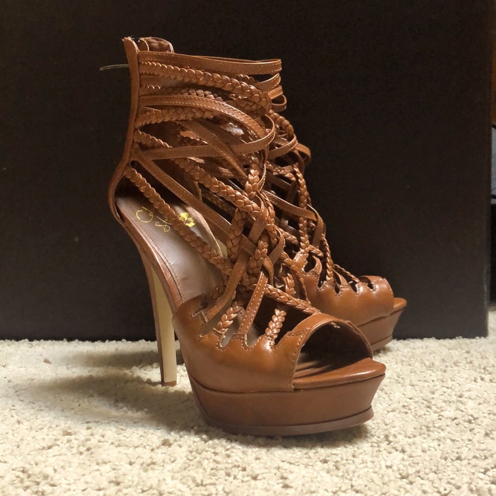 Colin Stuart Woven cage heeled sandal.